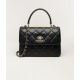CHANEL FLAP BAG WITH TOP HANDLE Lambskin & Gold-Tone Metal Black
